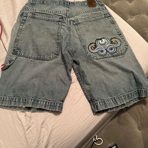 JNCO Blue Jean Shorts with 8ball on back pocket
